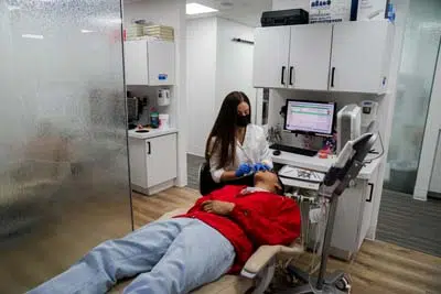 Dr. Freeman of North Texas Smiles providing orthodontic care for a patient